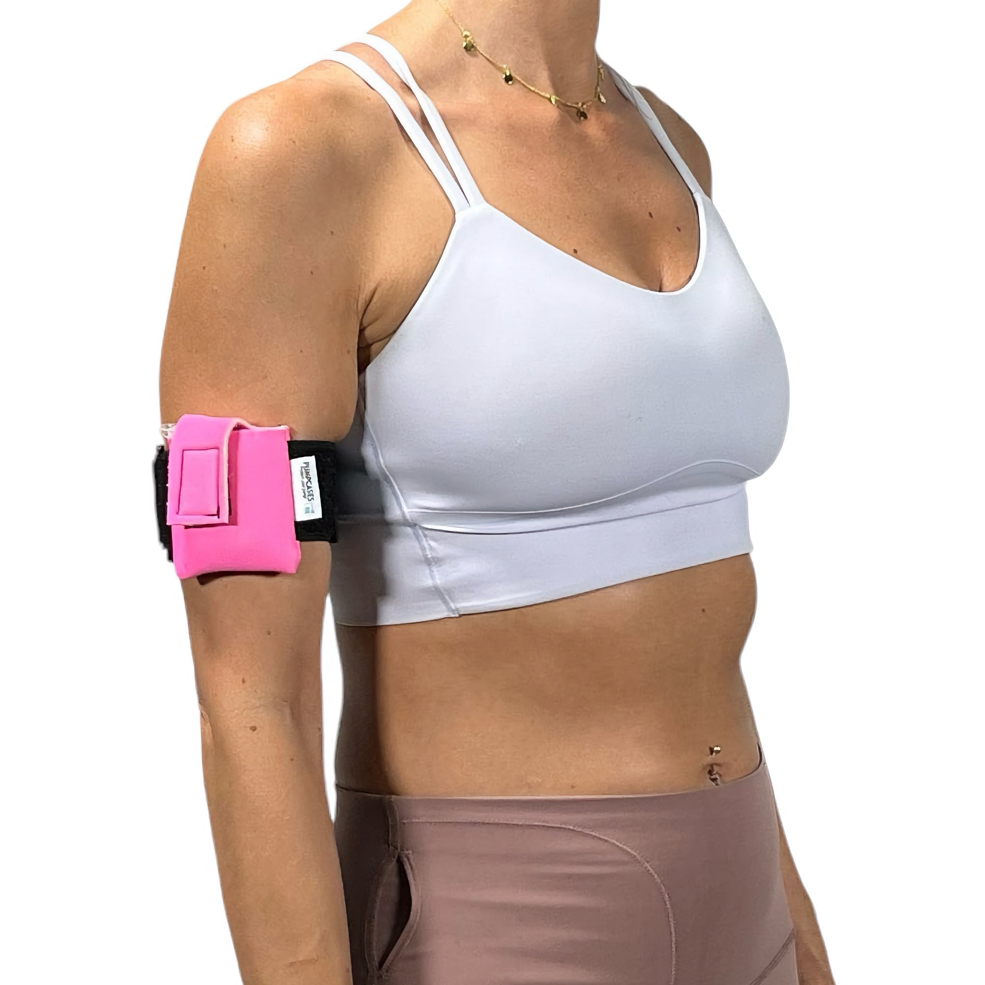 A woman wearing a Pumpcases pink Tandem Diabetes Mobi compatible armband case.
