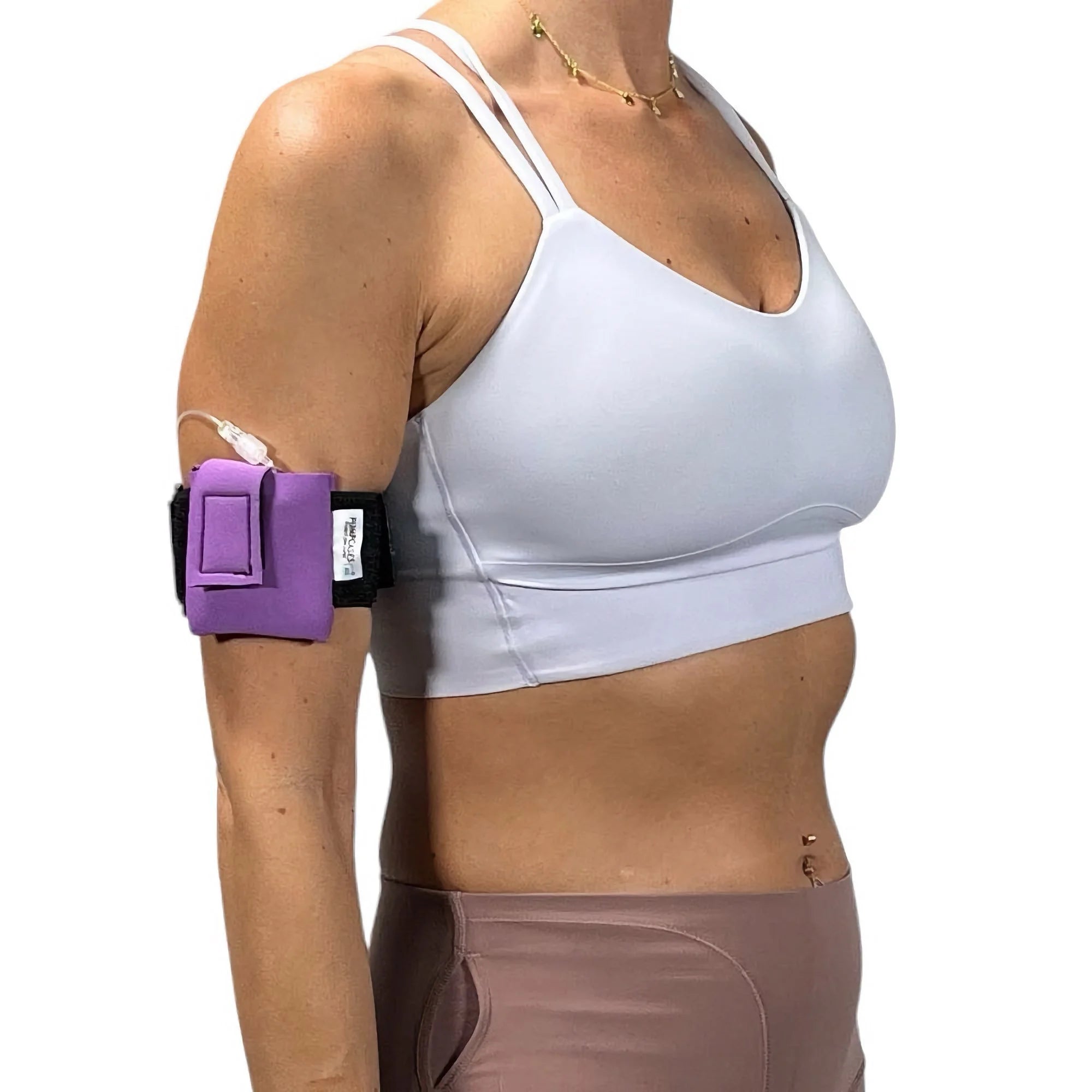 A woman wearing a Pumpcases lavender Tandem Diabetes Mobi compatible armband case.