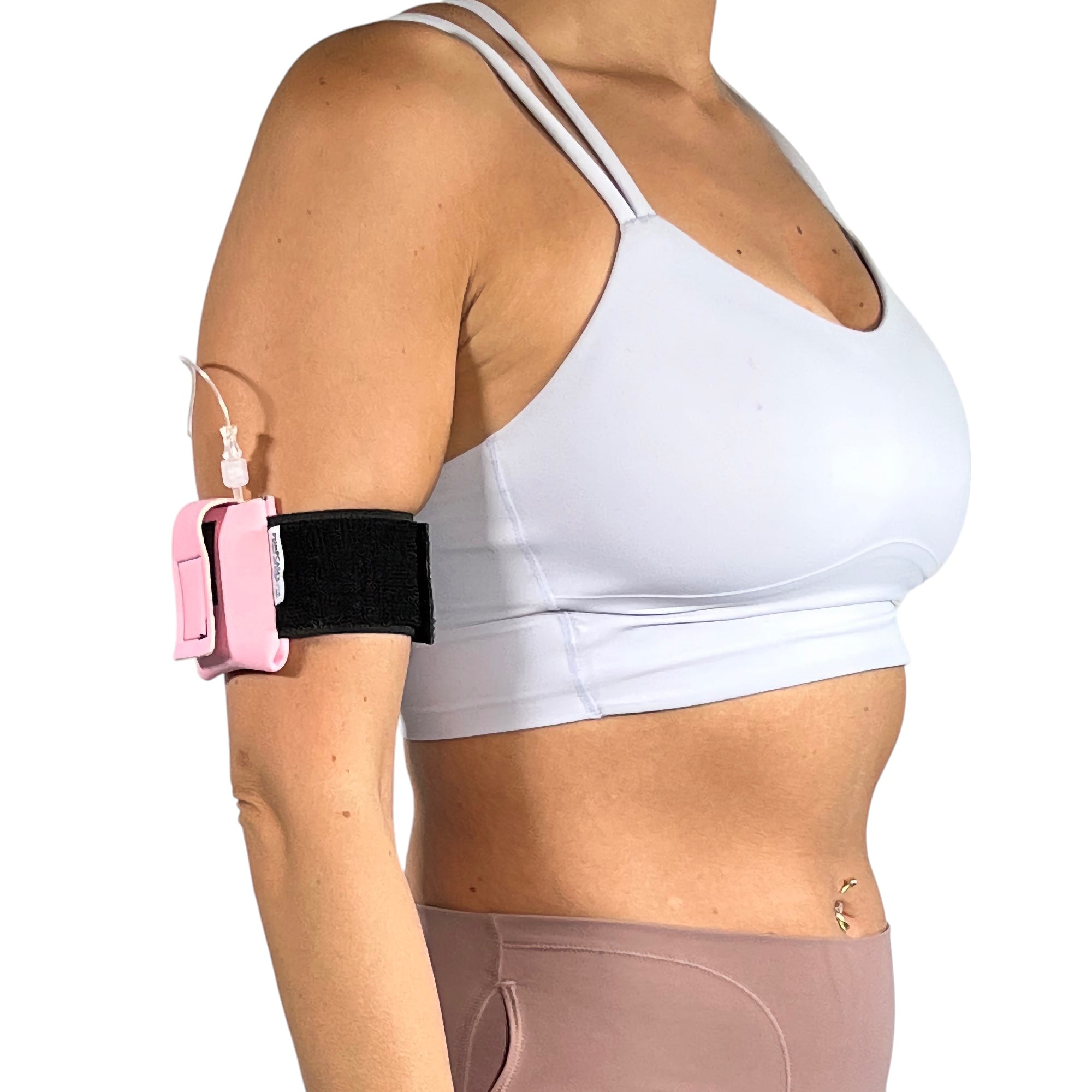 A woman wearing a Pumpcases rose pink Tandem Diabetes Mobi compatible armband case.