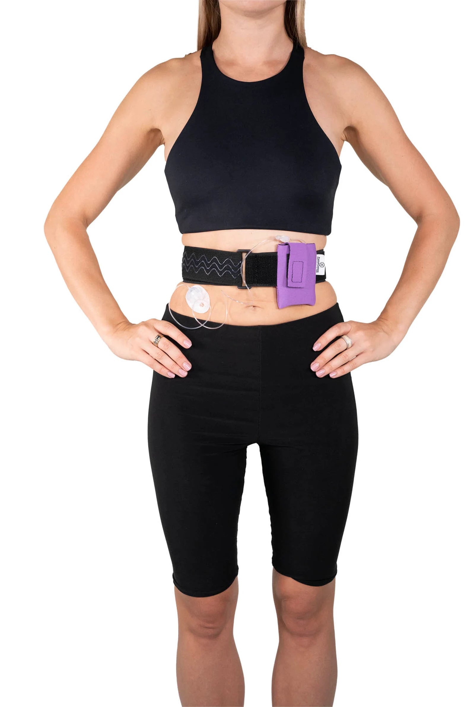A woman wearing a Pumpcases lavender waist belt case on a white background.
