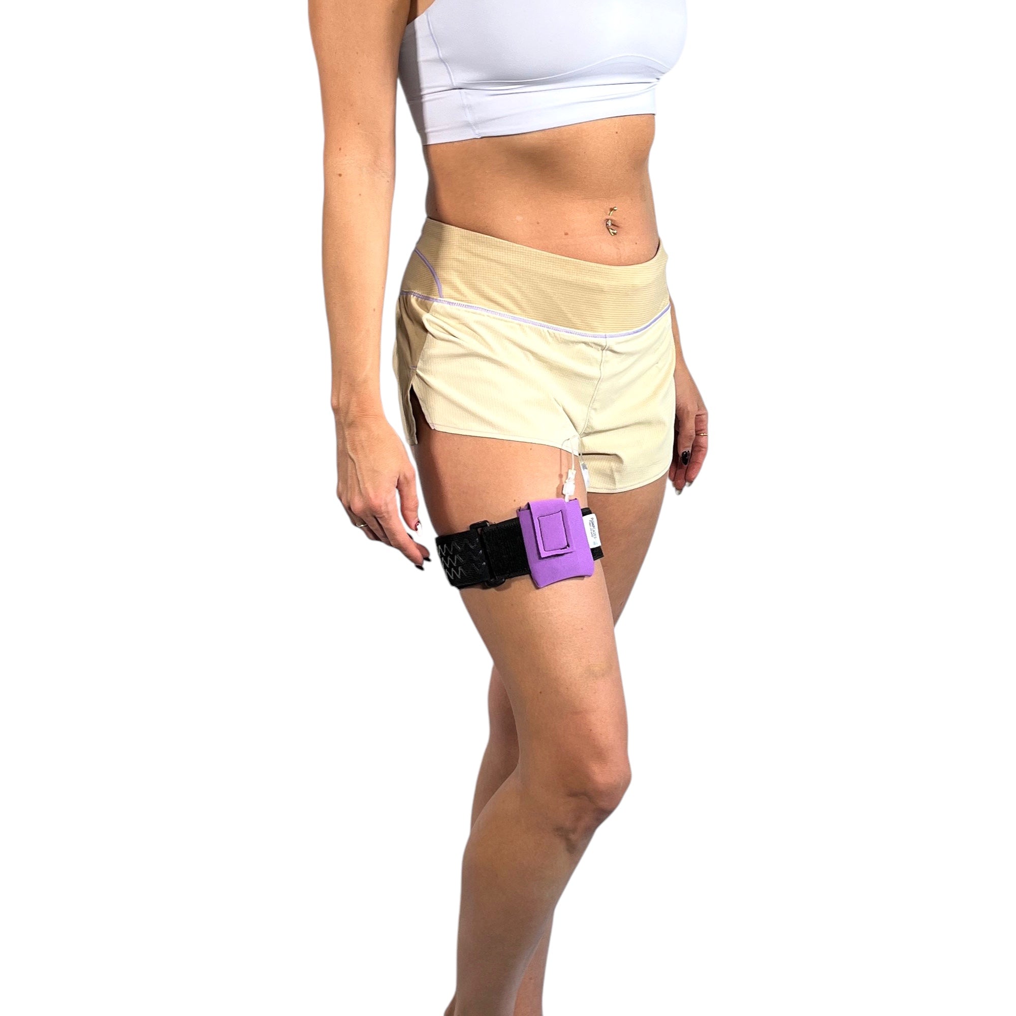 A woman wearing a Pumpcases lavender Tandem Diabetes Mobi compatible thighband case.