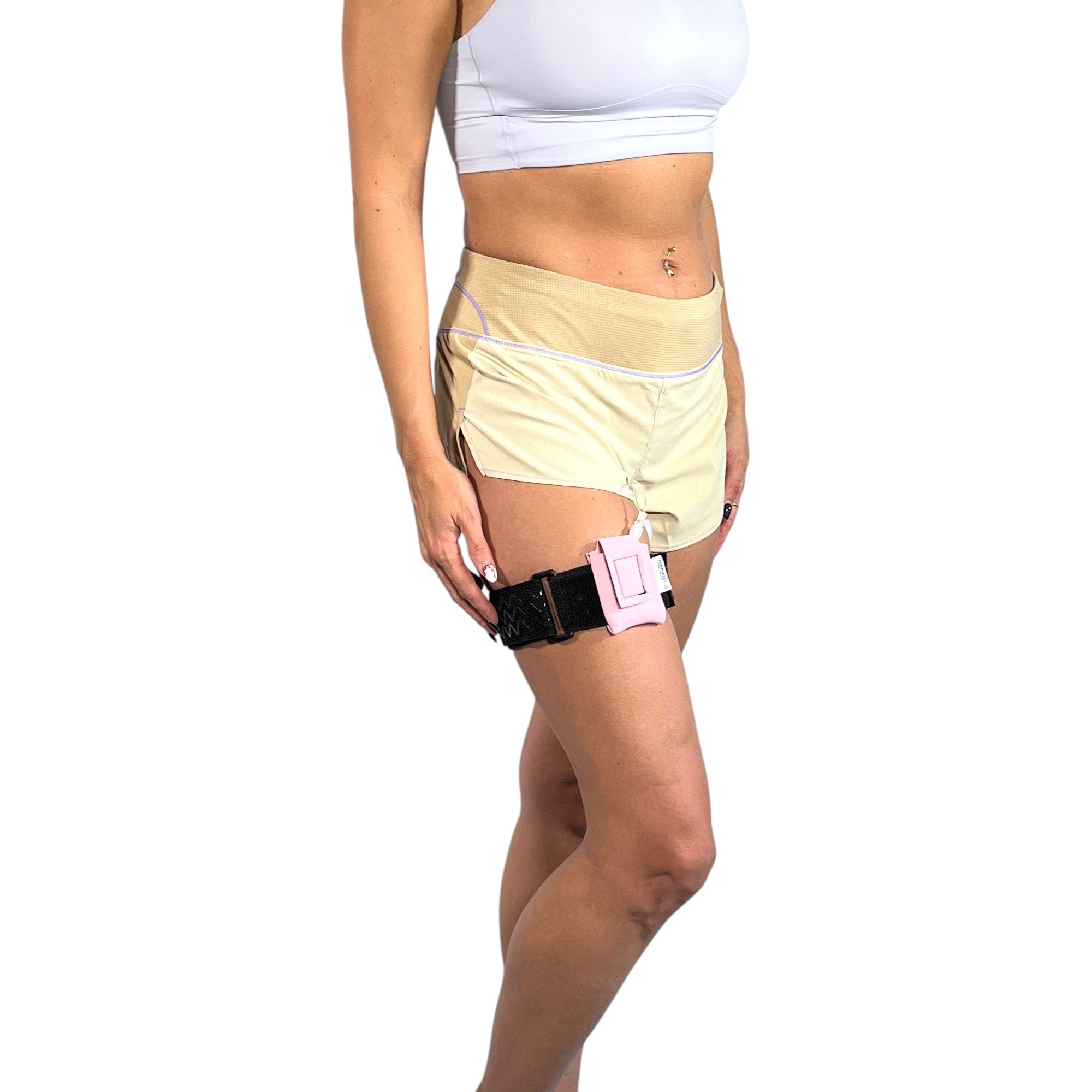 A woman wearing a Pumpcases rose pink Tandem Diabetes Mobi compatible thighband case.